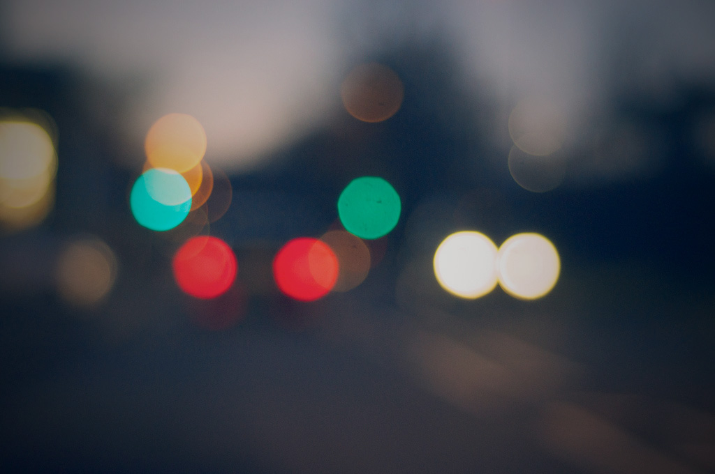 A photograph of car lights our of focus